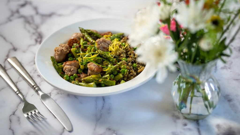 Creamy Pesto Farro with Sausage, Asparagus, and Peas