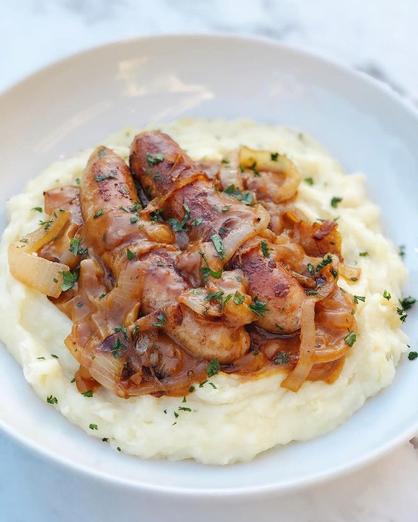 Bratwurst with Carmelized Onions and Guinness Reduction